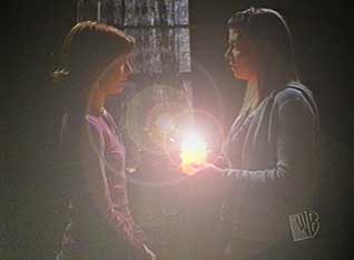 Willow and Tara perform a spell together